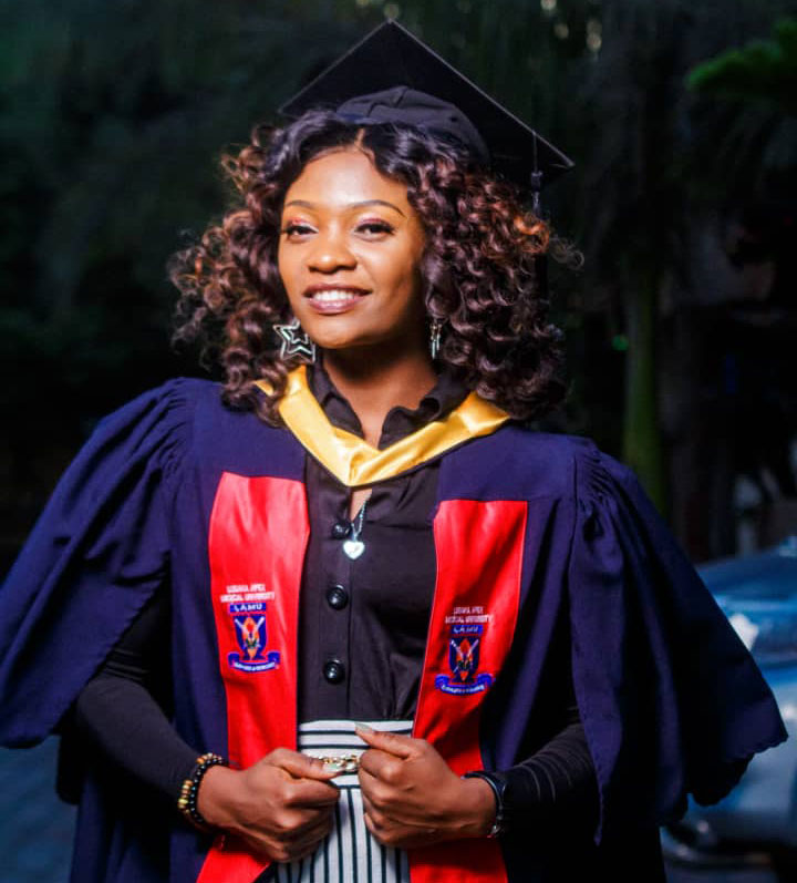 Anna Sekeleti in her university graduation cap and gown Anna Sekeleti in her university graduation cap and gown